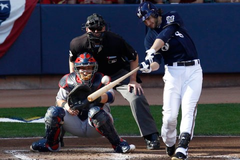 Milwaukee Brewers' Ryan Braun hits a two-run home run against the St. Louis Cardinals in the first inning of Game 1 of the MLB National League Championship Series baseball playoffs in Milwaukee