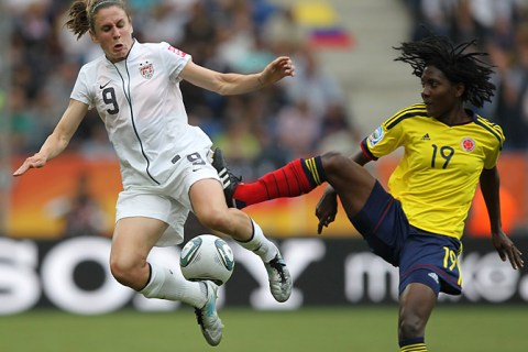 Fatima Montano of Colombia challenges Heather O'Reilly of the U.S.
