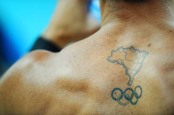 Taboo in Tokyo, tattoos on display at Olympics — AP Photos