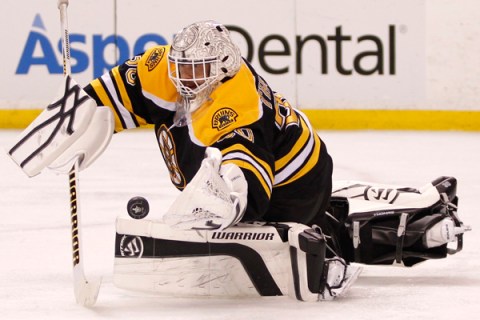 Boston Bruins goalie Tim Thomas makes a save against the Washington Capitals during the third period in Game 7 of their NHL Eastern Conference quarter-final hockey playoff series in Boston