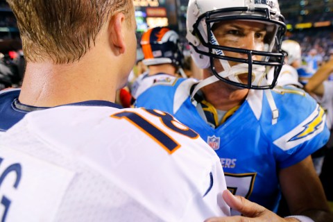 San Diego Chargers quarterback Rivers greets Denver Broncos quarterback Peyton Manning (L) after losing to Denver following their Monday Night NFL football game in San Diego