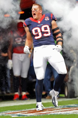 image: Houston Texans defensive end J.J. Watt is introduced before the game between the Buffalo Bills vs the Houston Texans at the Reliant Stadium in Houston Texas.