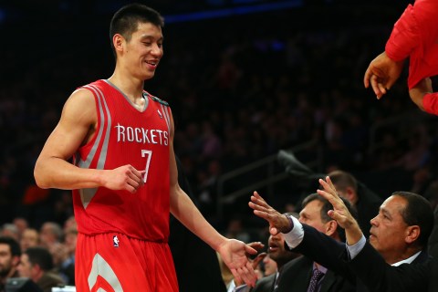 image: Jeremy Lin greeted on the bench during Houston's 109-96 win over the New York Knicks at Madison Square Garden in New York City, Dec. 17, 2012. 