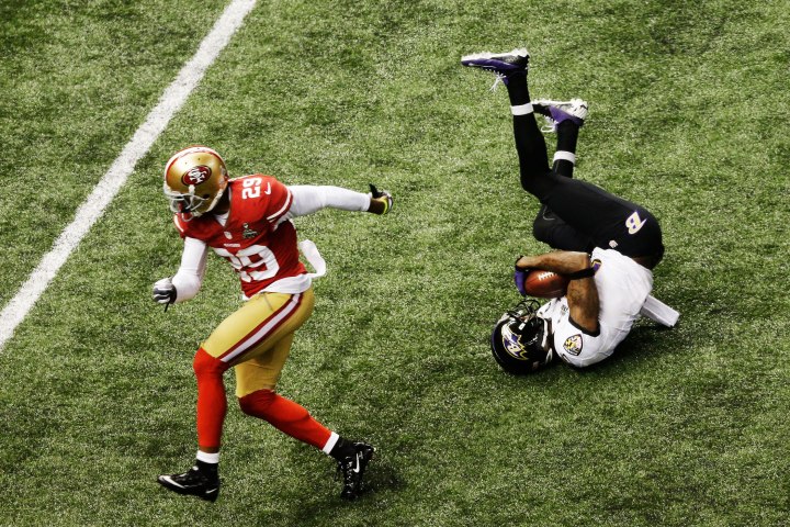Jacoby Jones of the Baltimore Ravens catches a 56-yard touchdown reception in the second quarter against Chris Culliver of the San Francisco 49ers during Super Bowl XLVII at the Mercedes-Benz Superdome in New Orleans, Feb. 3, 2013.