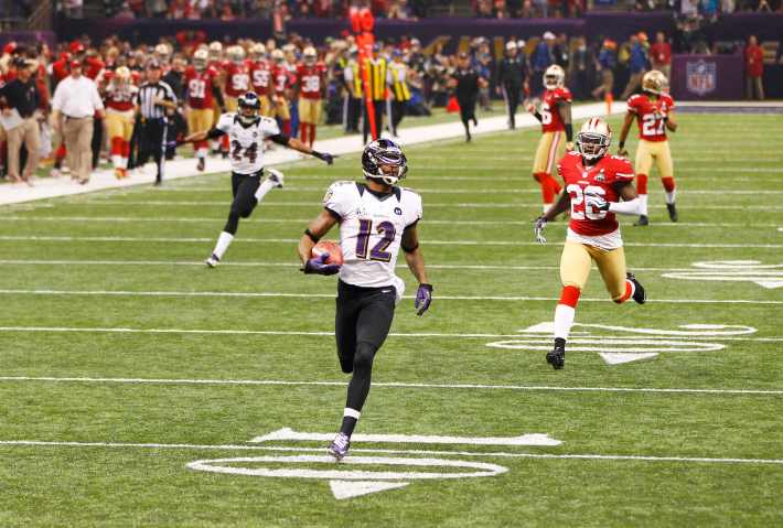 Baltimore Ravens wide receiver Jacoby Jones runs for a touchdown against the San Francisco 49ers during the third quarter in the NFL Super Bowl XLVII football game in New Orleans, Feb. 3, 2013. 