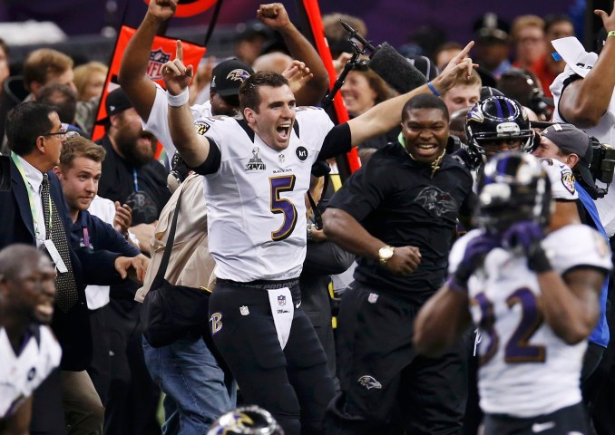 MVP and Baltimore Ravens quarterback Joe Flacco celebrates as the Ravens defeat the San Francisco 49ers to win the NFL Super Bowl XLVII football game in New Orleans, Feb. 3, 2013. 