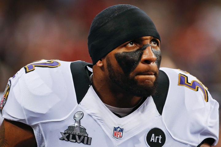 Baltimore Ravens linebacker Ray Lewis listens during team introductions before playing the San Francisco 49ers in the NFL Super Bowl XLVII football game in New Orleans, Feb. 3, 2013.