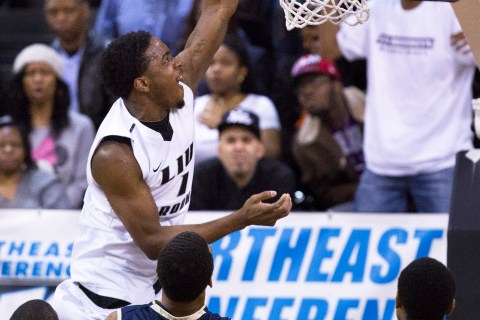 LIU Brooklyn's Jamal Olasewere dunks the ball during the second half of their NCAA Northeast Conference college basketball championship game against Mount St. Mary's.