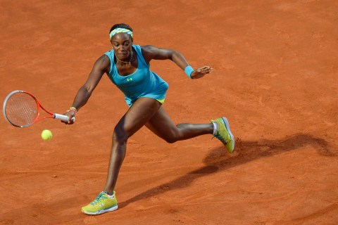 U.S. tennis player Sloane Stephens returns the ball to Russian Maria Sharapova during their match at the WTA Rome Open tennis tournament in the Foro Italico in Rome, on May 16, 2013.