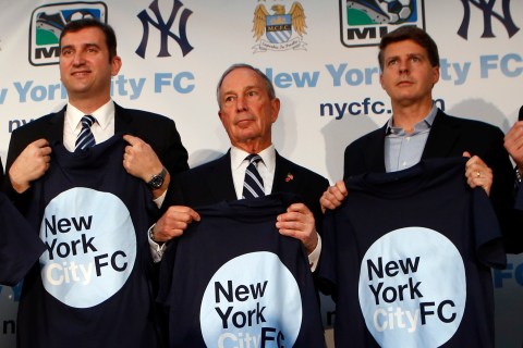 Principles hold New York City FC T-shirts at news conference in New York