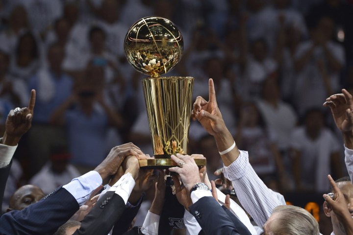 Lebron James holds the Championship trophy as Dwyne Wade cheers during the  celebration for the NBA 2012 Champions Miami Heat inside the American  Airlines Arena in Miami, Florida, June 25, 2012. UPI/Gary