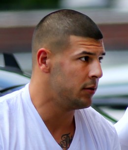 Former patriots player Aaron Hernandez is brought into Attleboro District Court in Attleboro, Mass., on June 26, 2013.
