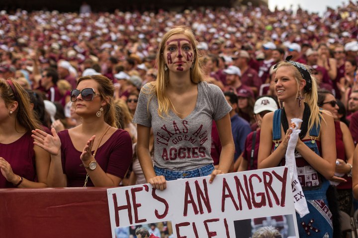 A Texas A&M football fan shows off her colors.