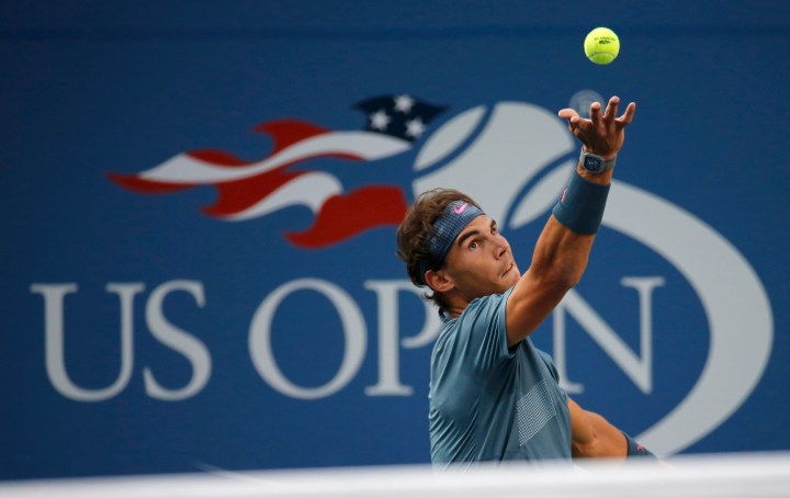 Nadal of Spain serves to Djokovic of Serbia in their men's final match at the U.S. Open tennis championships in New York