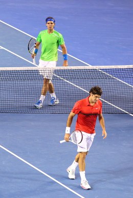 Roger Federer walks back to the baseline after losing a point to Rafael Nadal in their semifinal match at 2012 Australian Open in Melbourne.