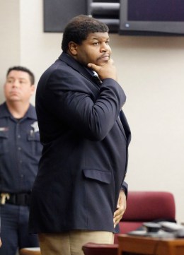 Former Dallas Cowboys NFL football player Josh Brent enters court to face sentencing for his intoxication manslaughter conviction in Dallas, Friday, Jan. 24, 2014.