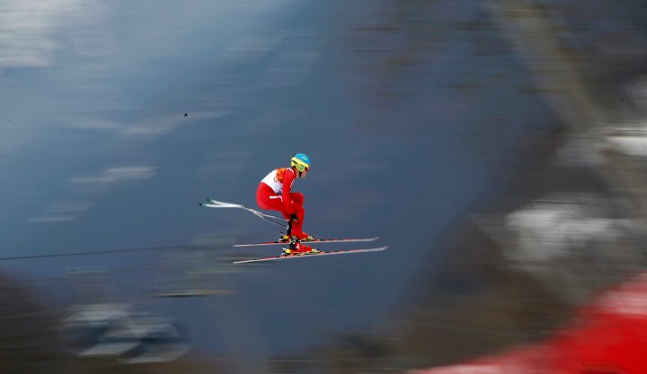 Denmark's Christoffer Faarup goes airborne during the downhill run of the men's alpine skiing super combined training session at the 2014 Sochi Winter Olympics at the Rosa Khutor Alpine Center Feb. 11, 2014.