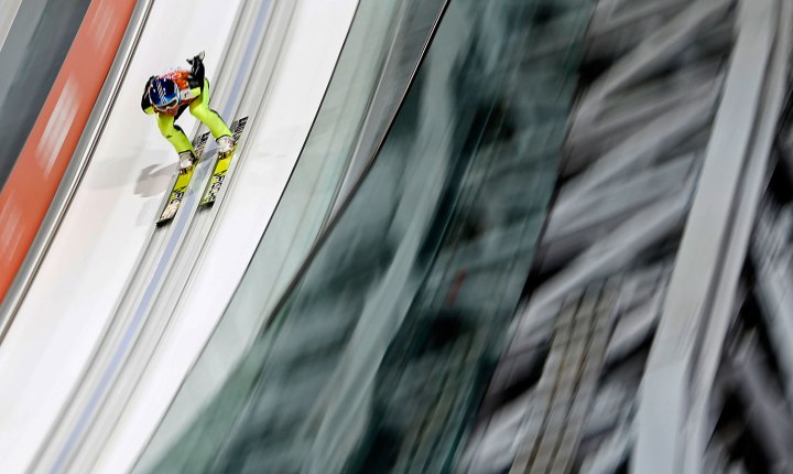 Germany's Severin Freund speeds down the ski jump in his trial jump of the men's ski jumping individual normal hill final event of the Sochi 2014 Winter Olympic Games in Rosa Khutor