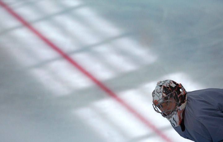 Canada's men's ice hockey team goalie Carey Price takes part in a team practice at the 2014 Sochi Winter Olympics