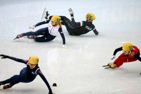 Elise Christie (rear left) of Great Britain and Arianna Fontana (rear right) of Italy collide in the women's 500m final of the Short Track events.